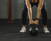 woman lifting a dumbbell